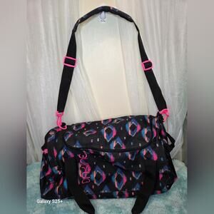 Dakine Black and Pink Patterned Travel Bag